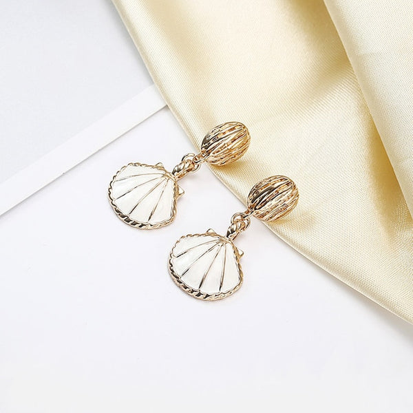 Pearlshine White Gold Accent Shell Earrings